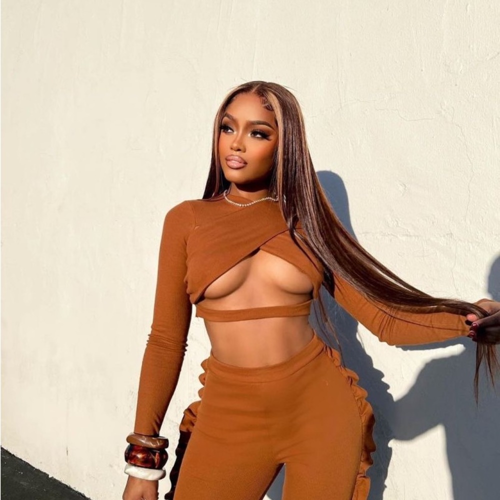 Orange two piece suit.